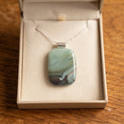Meadow Mist fused glass pendant presented in a Stoney Lake Glassworks gift box